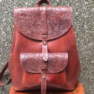 tooled leather backpack